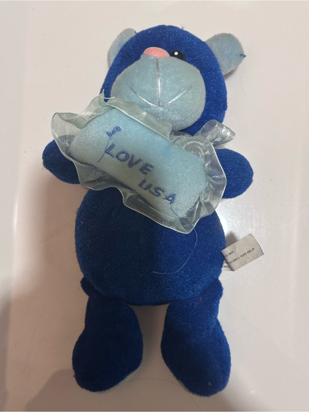 Blue Plush Bear Holding 'I Love USA' Pillow